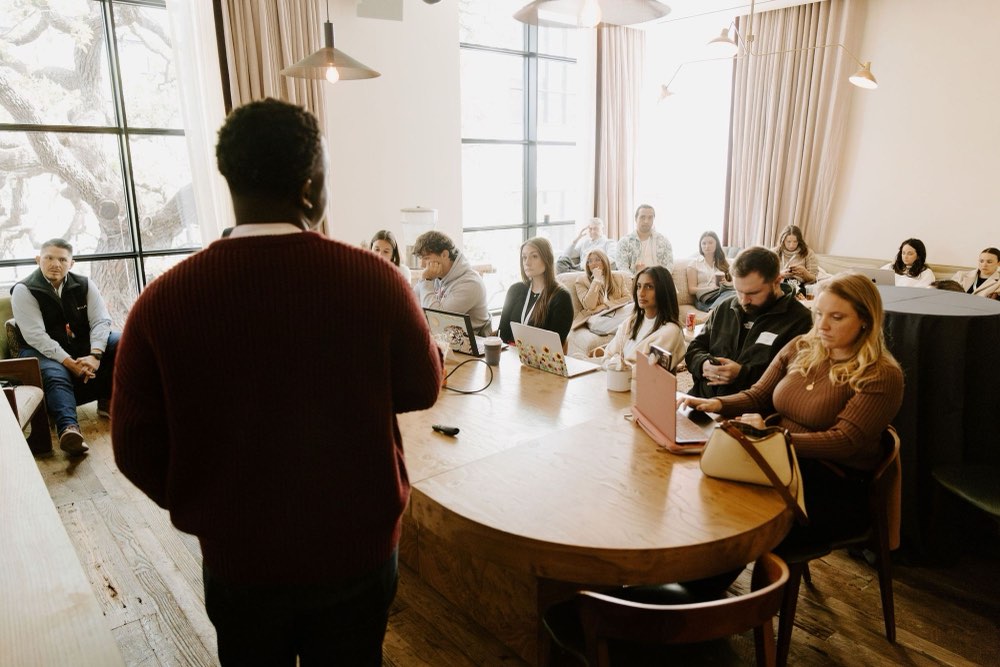 Nigel Chimwaza running a workshop with a revenue team