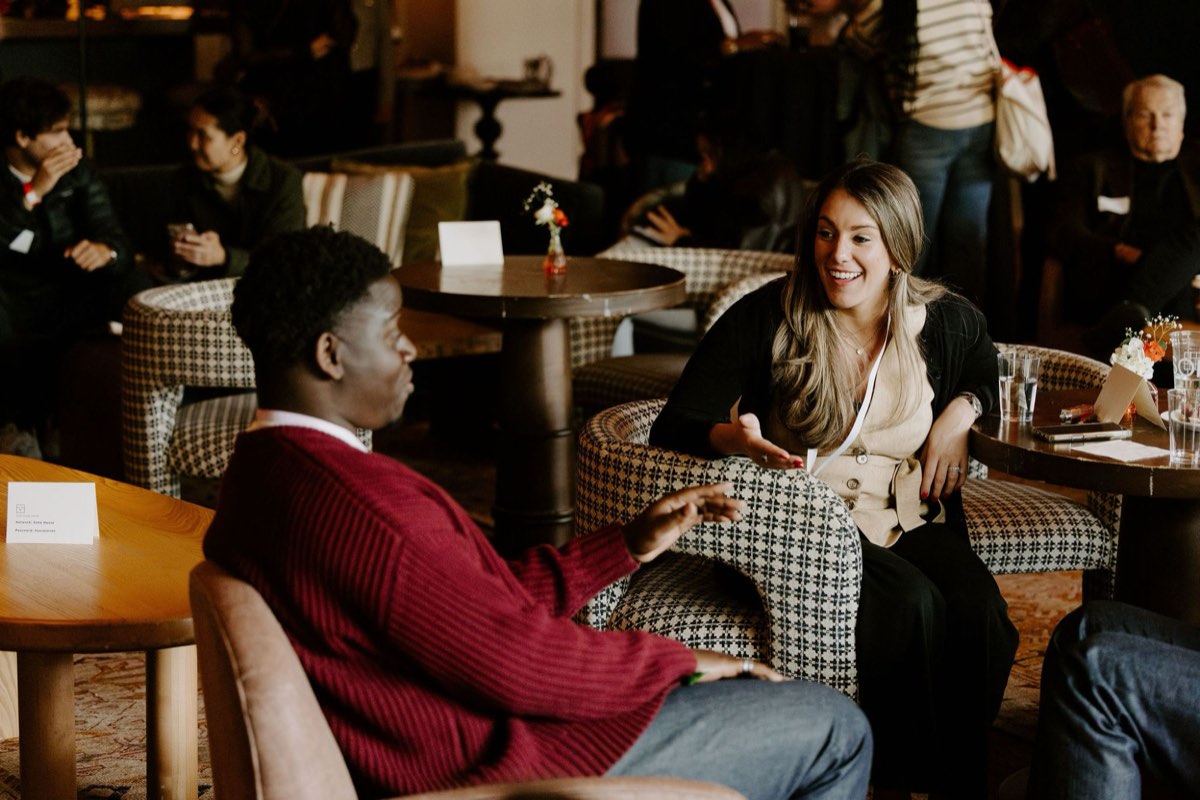 Nigel Chimwaza in conversation at a networking event