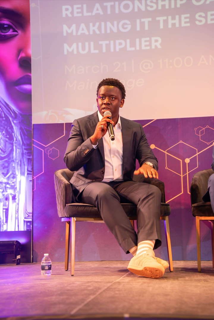 Nigel Chimwaza speaking on a conference panel